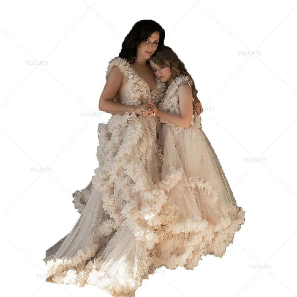 Elegant tiered ruffle tulle Mommy and Me matching dresses, perfect for mother-daughter and family photoshoots.