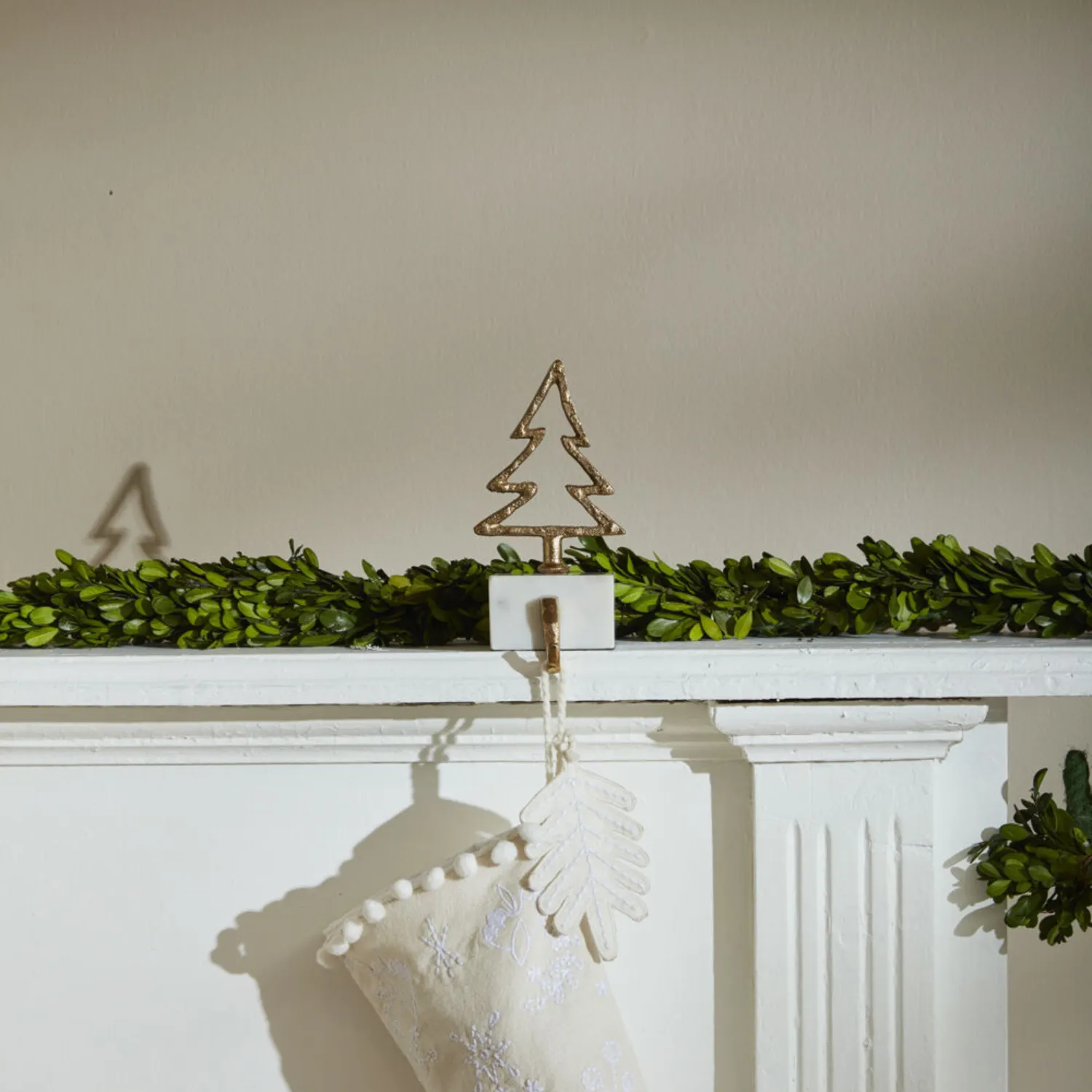 Festive White Marble Stocking Holders